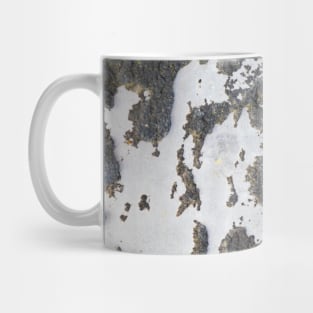 Grey tones on a scratch eroding surface. Mug